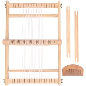 May include: A rectangular wooden weaving loom frame with vertical white warp threads, featuring a central movable heddle bar with slots, two long wooden weaving shuttles, and a curved wooden weaving comb with fine teeth for textile projects.