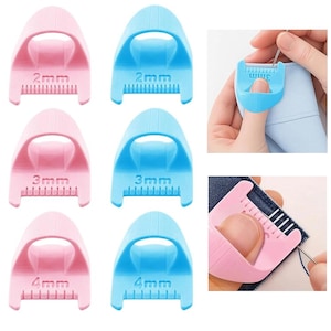 May include: Pink and blue seam guides with measurements of 2mm, 3mm, and 4mm. The tools have a curved handle and a toothed edge for precise seam allowances. The image also shows the guides in use with fabric and needles.