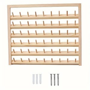 May include: A wooden thread spool holder with multiple pegs arranged in rows. The natural wood frame has a rectangular shape. Included are three screws and three wall anchors for mounting.