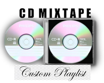 May include: Two CD-R discs with the text "CD MIXTAPE" above and "Custom Playlist" below. One disc is loose, the other is in a clear jewel case. The discs are silver with pink and green iridescent surfaces and the Philips logo.