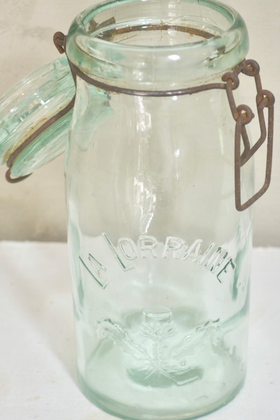 Conteneur Bocal En Verre. Emblème Vert De Style De Conception De Conteneur Bocal En Verre. Emblème Vert De Style De Conception De