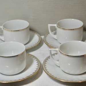 Four Vintage White with Gold Porcelain Mismatched Café Cups and Saucers