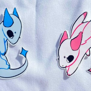 Schattige roze en blauwe kawaii-stickers draak