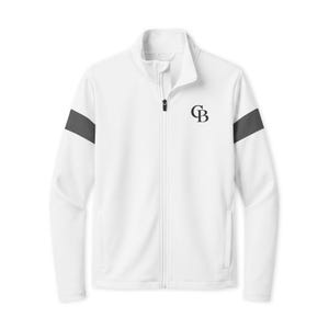 May include: A white full-zip jacket featuring a mock neck collar and long sleeves with dark gray horizontal bands on the upper arms. The left chest displays the black letters GB in a serif font. The jacket has a central zipper closure.