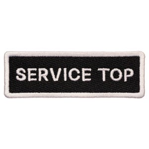 May include: White text on a black background reads "SERVICE TOP" on a rectangular patch with a white border.