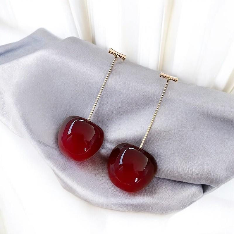 Bijoux: 37 orecchini lunghi e grandi per l'inverno 2017-2018. Tendenze