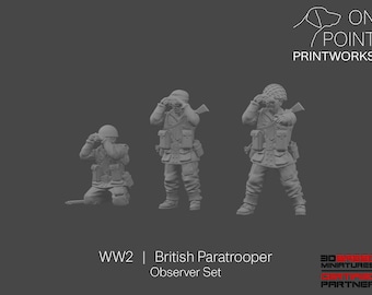 May include: A set of three grey miniature figures representing WW2 British paratroopers in observer poses. One figure is kneeling while two are standing, all wearing helmets and gear, holding binoculars to their eyes. Text reads WW2 British Paratrooper Observer Set.