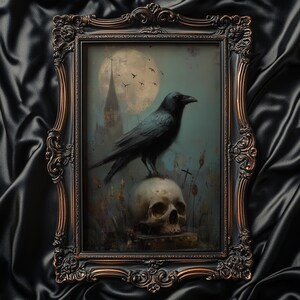May include: A framed gothic art print featuring a black crow perched atop a human skull. The artwork is set against a backdrop of a full moon, a church spire, and flying birds. The ornate frame has a dark bronze finish.