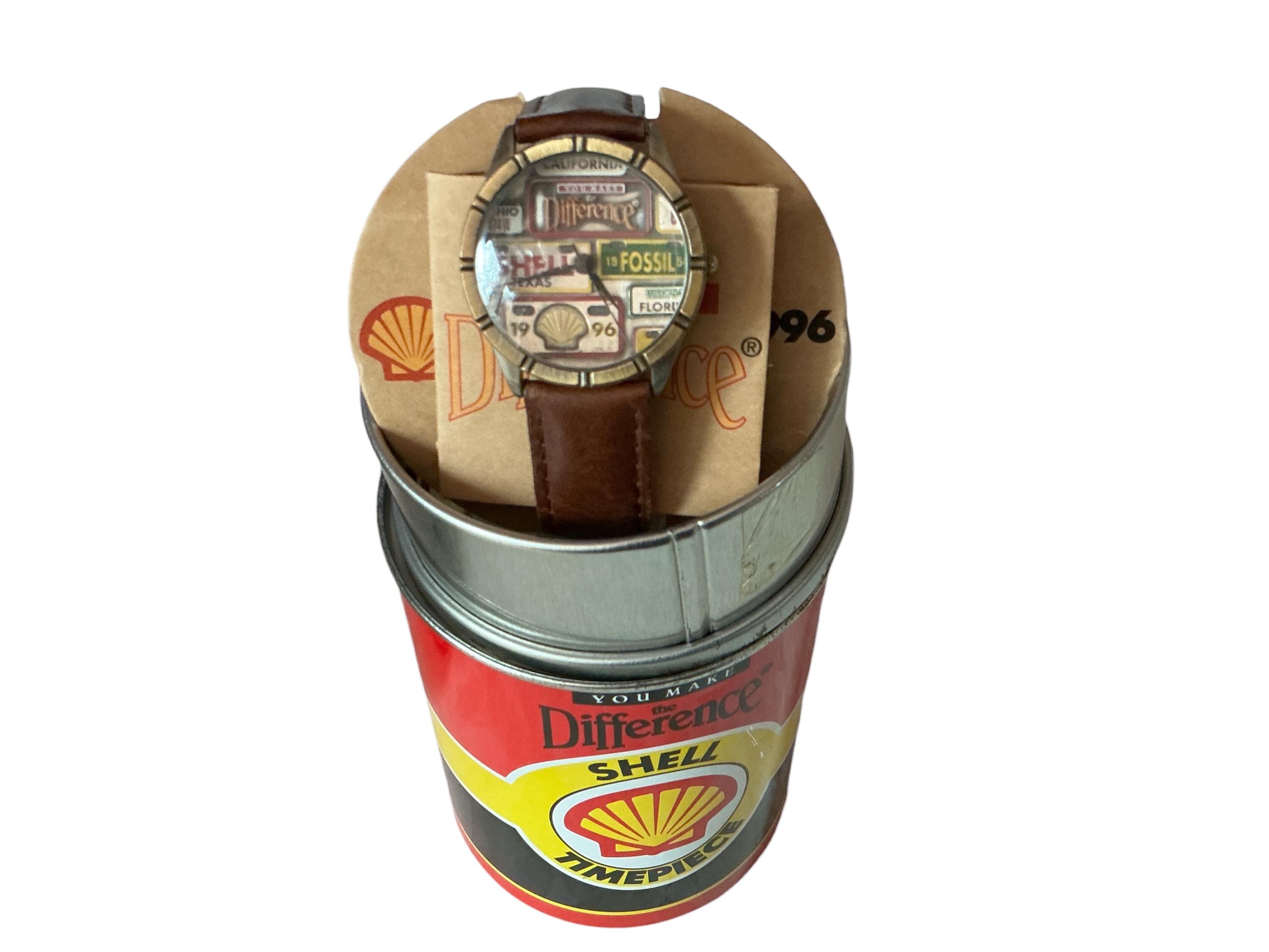 Vintage Shell Oil Company Collectible Fossil Watch License Plate