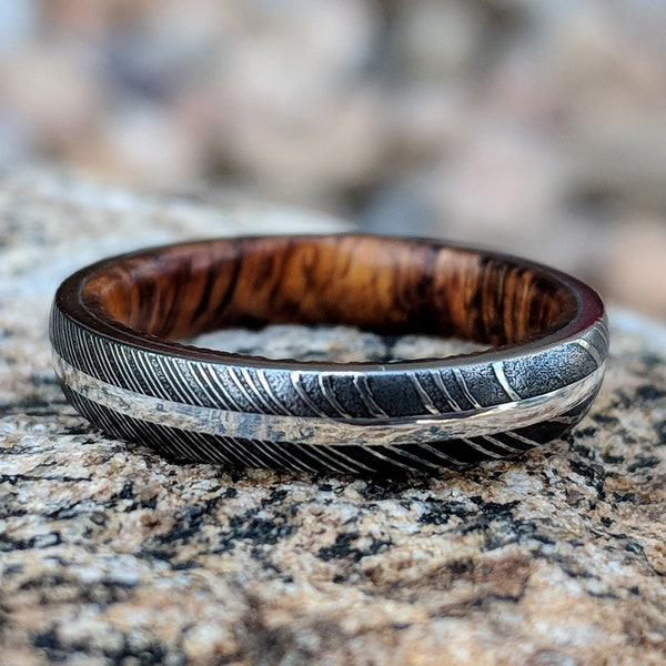 Damascus Steel Wedding Band With Arizona Ironwood Sleeve And 14k White Gold Inlay