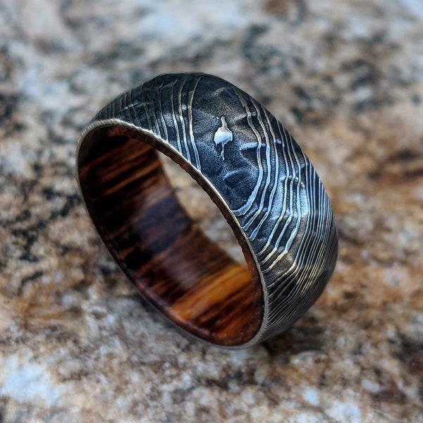 Mens Wedding Band Damascus Steel Ring With Ironwood Sleeve DS-BLK-8HR-Hammered-IronWoodSleeve