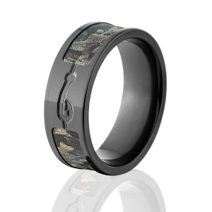 May include: Black tungsten carbide ring with a camouflage pattern and a fishing hook design. The ring is about 8mm wide.