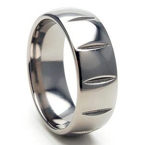 May include: A silver titanium ring with a grooved design. The ring is polished and has a smooth finish.