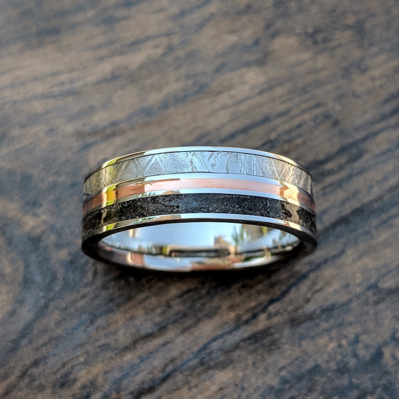 Meteorite Ring with Dinosaur Fossil Inlay and Copper Center image 0