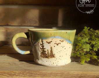 Handmade Ceramic Mug with Forest and Mountain Motif