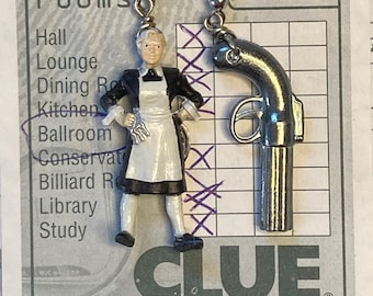 Clue token earrings #2. The Sneaky Maid Mrs. White and An Ominous Revolver Dangle Whimsically On Mis-matched Upcycled Game Piece Earrings