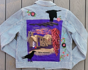 Upcycled SZ M Denim Jacket. Hand Embroidered Flowers Appliqued Ravens and New Mexico Tshirt Makes This Lively Art Jacket Very Special