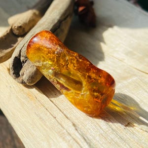 May include: A set of three ceramic nesting bowls in shades of blue, green, and white. The bowls feature a speckled glaze and a simple, modern design. The largest bowl measures approximately 6 inches in diameter.