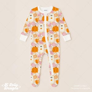 May include: A baby's footed pajama with a Halloween-themed pattern. The cream-colored onesie features a repeating design of orange pumpkins, white ghosts, and pink and orange candies. It has a white zipper and cuffs.