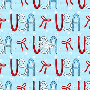 May include: A repeating pattern on a light blue background featuring the word "USA" in red, white, and blue. The letters are outlined in red and blue, with white filling. Red bows and small white flowers are scattered throughout the design.