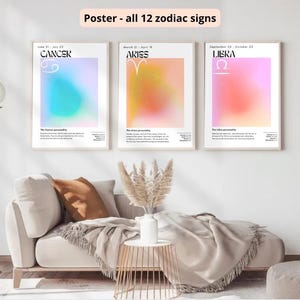 Op de afbeelding: Drie ingelijste posters met een verloopachtergrond en een symbool voor het sterrenbeeld in het midden. De posters zijn getiteld "Kreeft", "Ram" en "Weegschaal" met de bijbehorende data voor elk sterrenbeeld.