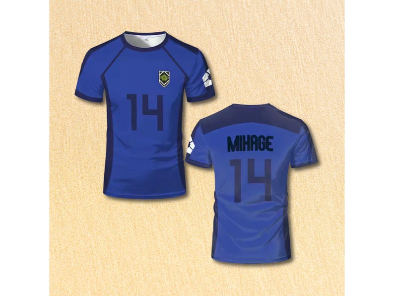 May include: Blue athletic jersey with the number 14 on the front and back. The front of the jersey has a small emblem and the back has the name "MIHAGE". The jersey has dark blue accents on the shoulders and sides.