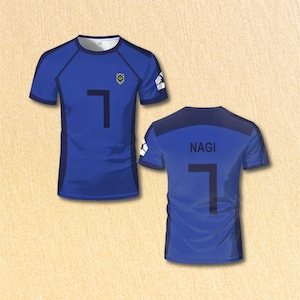 May include: Blue short-sleeved athletic jersey with the number 7 in black on the front and back. The back of the jersey also displays the name "NAGI". The jersey has a small emblem on the chest.