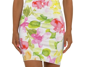 May include: A white pencil skirt with a watercolour floral pattern. The design features pink, red, and yellow flowers with green leaves. The skirt is a bodycon style.