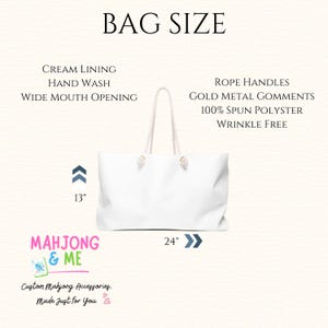 May include: White tote bag with rope handles and gold metal accents. The bag is 24 inches wide and 13 inches tall. Features include a cream lining, wide mouth opening, and is made of 100% spun polyester. The text "BAG SIZE" is at the top.