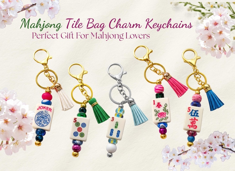 May include: Mahjong tile bag charm keychains with gold and silver-tone hardware. Each charm features a Mahjong tile, colorful beads, and a tassel. The charms have the text "JOKER", "5", "3", "1", and "伍萬".