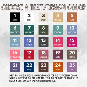 May include: A color chart with 25 different color swatches, each with a number and a name. The colors include black, white, ivory, mustard, yam, light green, blue spruce, moss, sea foam, blue jean, ice blue, flo blue, pepper, crunchberry, hot pink, watermelon, chili, crimson, berry, espresso, grape, navy, mocha, orange, and lilac. The text at the bottom says 'Input this code in the personalization box for the text/design color. Want a different color? Just add your color code or request to match a shirt color in the personalization box.'