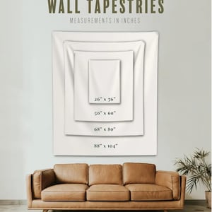 May include: White wall tapestries in various sizes are displayed against a light wall. The sizes are 26" x 36", 50" x 60", 68" x 80", and 88" x 104". The text "WALL TAPESTRIES" and "MEASUREMENTS IN INCHES" are at the top. A brown leather sofa sits below.