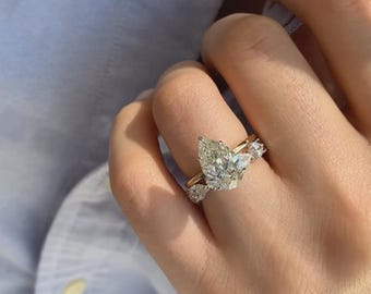2 Carat Pear Cut Moissanite Engagement Ring: 14K Gold Hidden Halo