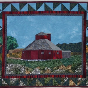 May include: A red barn with a gray roof and white polka dots sits in a field of green grass. The barn is surrounded by a blue sky and green hills in the background. The image is framed with a border of green and blue triangles.