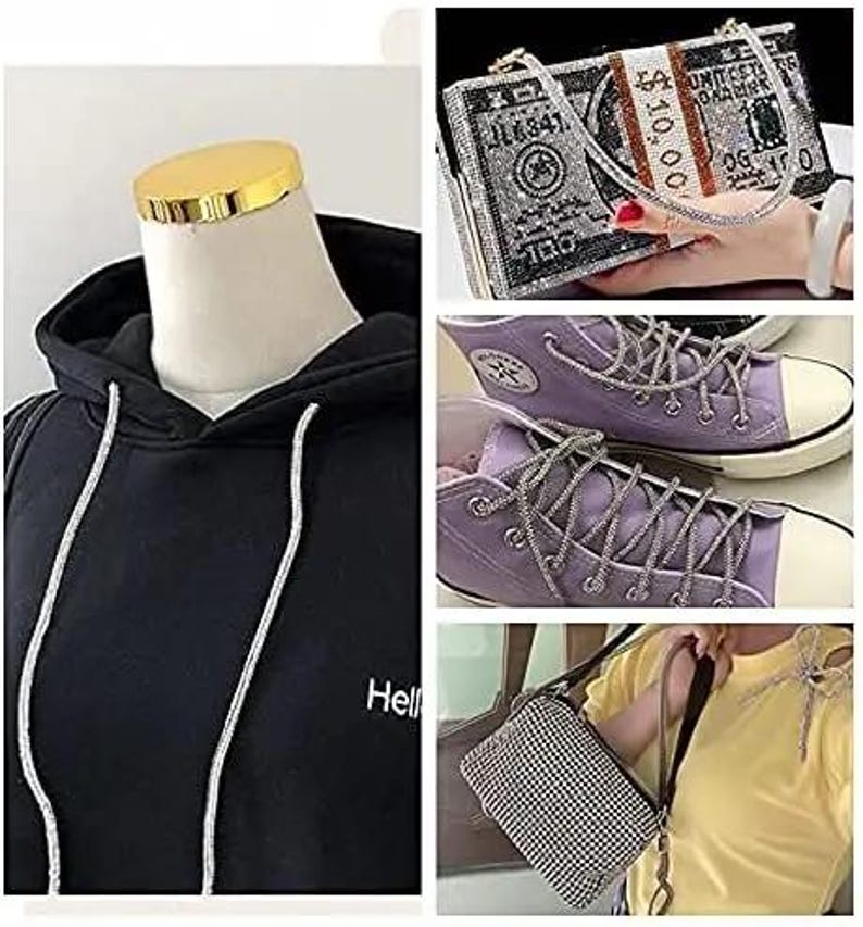 May include: A black hoodie with white drawstrings and the word "Hello" printed on the front. Also shown are a rhinestone-covered dollar bill clutch, purple sneakers with rhinestone laces, and a small black and white checkered purse.