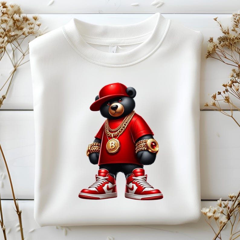 Puede incluir: Un oso negro con una camisa roja, una cadena de oro y una gorra de b&eacute;isbol roja. El oso lleva zapatillas rojas y blancas. El oso es un personaje de dibujos animados.