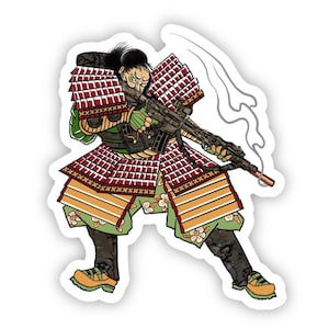 May include: A sticker featuring a cartoon samurai warrior wearing red and gold armor, holding a rifle with smoke coming from the barrel. The warrior has a fierce expression on their face.