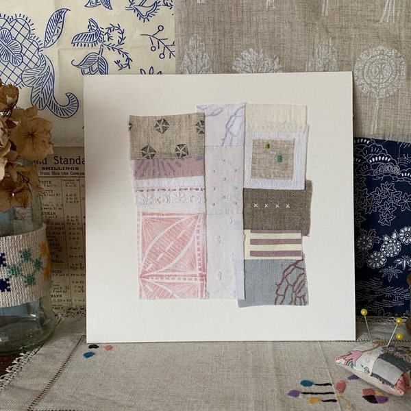 Embroidered patchwork textile wall art with block print and vintage fabric and lace