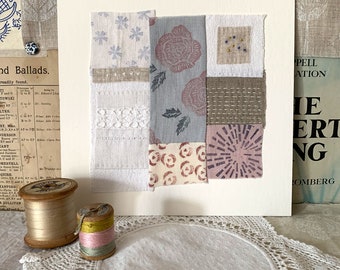 Block printed rose linen and antique lace patchwork textile wall art with embroidery and vintage fabric