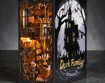 May include: A decorative wooden book nook with a detailed interior of a library, illuminated by warm lighting. The right side features a spooky scene with a haunted house, full moon, and the text "Dark Family".