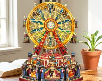 May include: A decorative Ferris wheel with a circus theme. The wheel is gold and red, with blue and yellow accents. The base features a circus tent and various animated figures. The text "The Funland Park" is visible on the base.