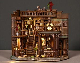 May include: A detailed wooden miniature of a library with multiple levels, bookshelves, and a staircase. The model features warm lighting, decorative elements, and a balcony. The overall color scheme is brown with accents of green and red.