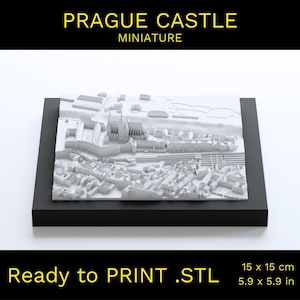 May include: A white 3D printed model of Prague Castle, a miniature replica of the famous Czech landmark. The model is 5.9 inches by 5.9 inches and is ready to be printed.