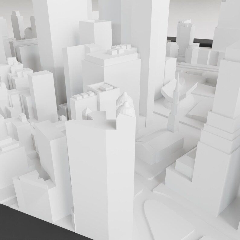 May include: A white 3D model of a city skyline with tall buildings and streets.