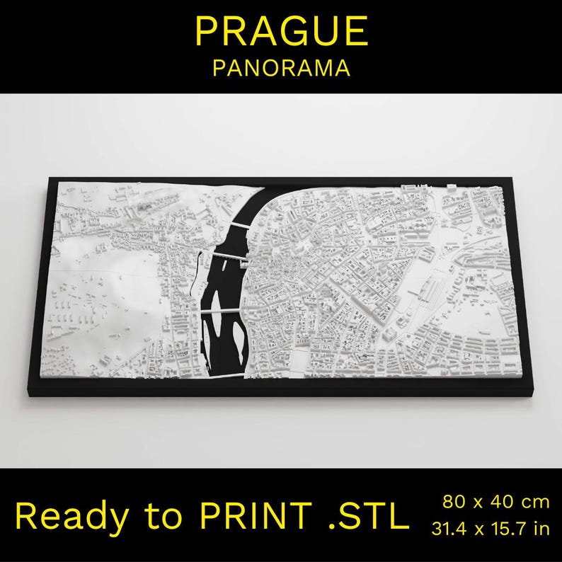 May include: A white 3D relief map of Prague, Czech Republic, set in a black frame. The map shows the city's layout, including the Vltava River. The text "PRAGUE PANORAMA" is at the top. The dimensions are 31.4 x 15.7 inches.