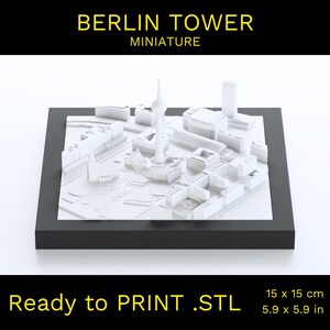 May include: A white 3D printed model of the Berlin Tower, a miniature replica of the famous landmark. The model is 15 cm by 15 cm and is ready to print.