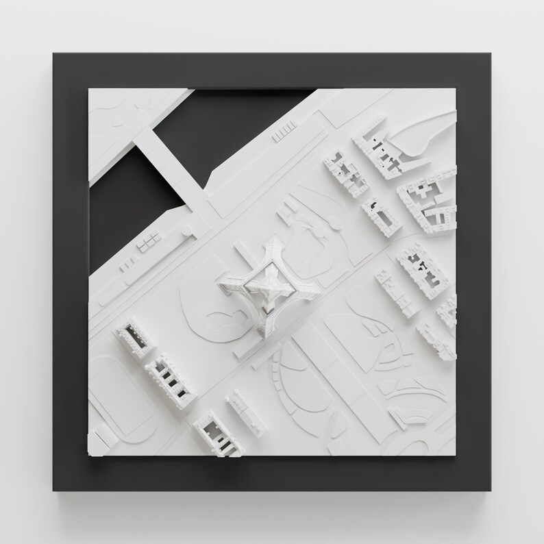 K&ouml;nnte beinhalten: Ein wei&szlig;es 3D-Modell einer Stadt mit einem hohen Geb&auml;ude in der Mitte. Das Modell ist in einem schwarzen Rahmen gerahmt.