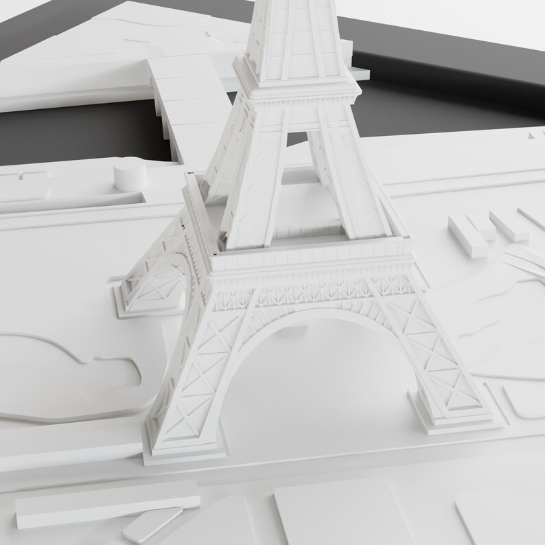 K&ouml;nnte beinhalten: Ein wei&szlig;es Modell des Eiffelturms, ein ber&uuml;hmtes Wahrzeichen in Paris, Frankreich. Das Modell ist aus glattem, wei&szlig;em Material gefertigt und weist komplizierte Details auf. Das Modell steht auf einer wei&szlig;en Oberfl&auml;che.