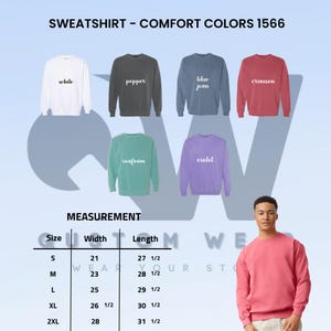 May include: A display of six crewneck sweatshirts in various colors: white, pepper, blue jean, crimson, seafoam, and violet. The image includes a size chart with measurements in inches and the text "SWEATSHIRT - COMFORT COLORS 1566."