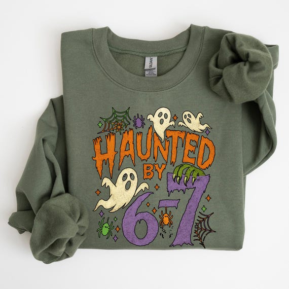 Haunted by 6 7 Sweatshirt, 67 Sweatshirt, Spooky Meme Sweat, Viral TikTok Funny Phrase, Ghostly Internet Joke, Scary Trend Six Seven Hoodie